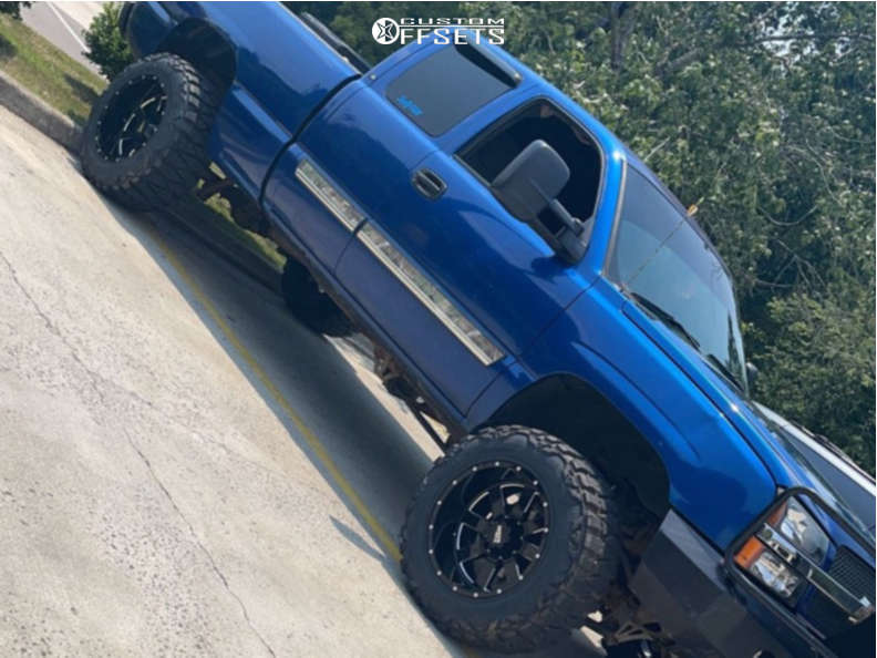 2003 Chevrolet Silverado 1500 Aggressive > 1" outside fender on 20x12 -44 offset Moto Metal Mo962 and 35"x12.5" Nitto Mud Grappler on Suspension Lift 6" - Custom Offsets Gallery